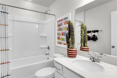 The Ford is a well-designed one-story home featuring three - photo 4