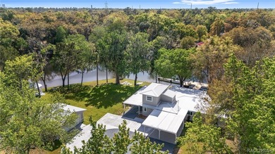 Spectacular tip-lot riverfront property with over 200 feet of - photo 1