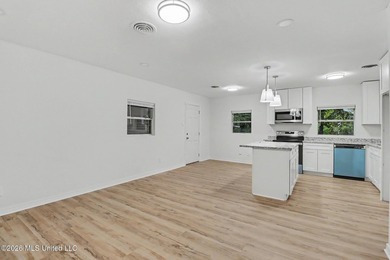 Completely renovated and move-in ready, this stunning 3-bedroom - photo 5