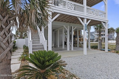 Located in North Topsail Beach, this custom-featured, truly