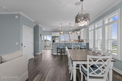 Located in North Topsail Beach, this custom-featured, truly