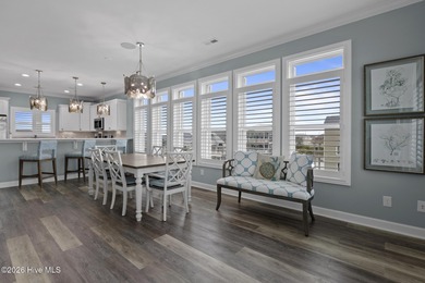 Located in North Topsail Beach, this custom-featured, truly
