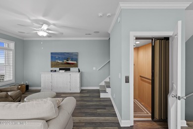 Located in North Topsail Beach, this custom-featured, truly