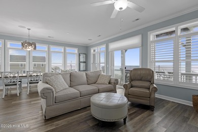 Located in North Topsail Beach, this custom-featured, truly