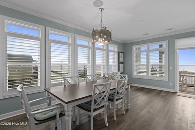Located in North Topsail Beach, this custom-featured, truly