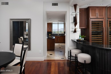 Perched high on the 10th floor of prestigious Esplanade Place