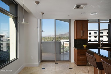 Perched high on the 10th floor of prestigious Esplanade Place