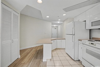 BRAND NEW LISTING! NEW FLOORING! NEW PAINT! Low floor -Ewa/Mauka