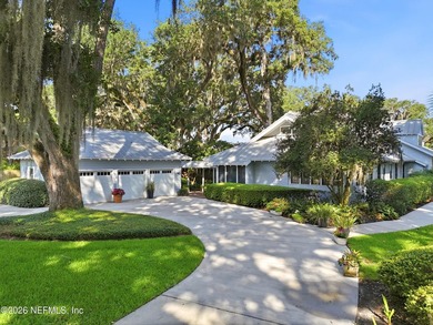 Surrounded by magnificent oaks draped w/ Spanish moss & - photo 1