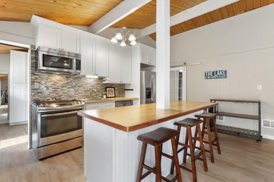 Edgewater Terrace is home to this peaceful, wooded setting on - photo 5