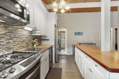 Edgewater Terrace is home to this peaceful, wooded setting on - photo 6