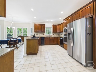 Welcome to 1120 Laurel Pointe, a spacious all-brick home with a - photo 7