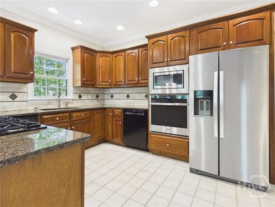 Welcome to 1120 Laurel Pointe, a spacious all-brick home with a - photo 9