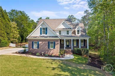 This stunning 5-bedroom, 4.5-bath brick home truly checks every - photo 1
