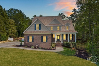 This stunning 5-bedroom, 4.5-bath brick home truly checks every - photo 2