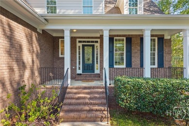 This stunning 5-bedroom, 4.5-bath brick home truly checks every - photo 3