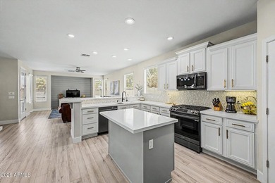 Welcome to luxury living on the 12th tee box in the prestigious - photo 23