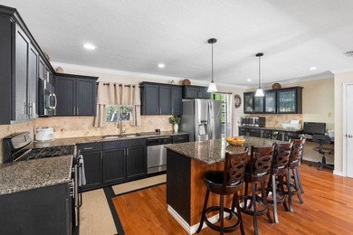 This fully furnished, move-in ready home features 3 bedrooms and - photo 11