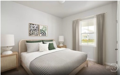The Dunlin floorplan features an open, easy-living layout in a - photo 5