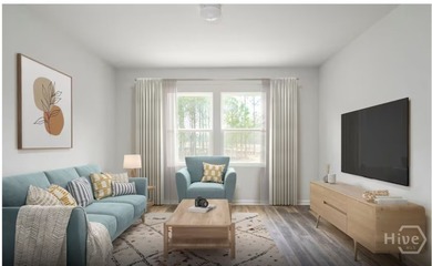 The Dunlin floorplan features an open, easy-living layout in a - photo 7