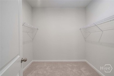 The Dunlin floorplan features an open, easy-living layout in a - photo 9