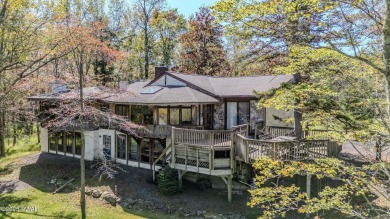 This lake house is full of surprises & is definitely not your - Lake Home For Sale in Pocono Lake, Pennsylvania