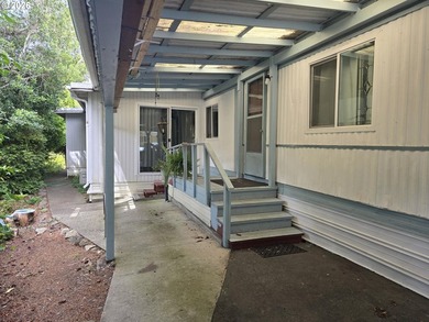 Updated 2BD 1BA home with bonus room and workshop/storage space - photo 1