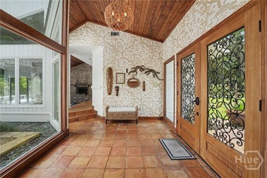 Set on a generous private lot at the end of a quiet street, this - photo 4
