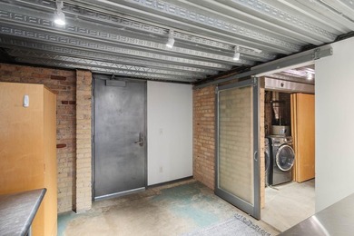 Located in the historic 801 lofts, this authentic loft offers a - photo 12