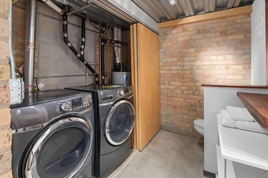 Located in the historic 801 lofts, this authentic loft offers a - photo 14