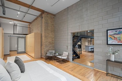 Located in the historic 801 lofts, this authentic loft offers a - photo 21