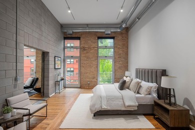 Located in the historic 801 lofts, this authentic loft offers a - photo 22
