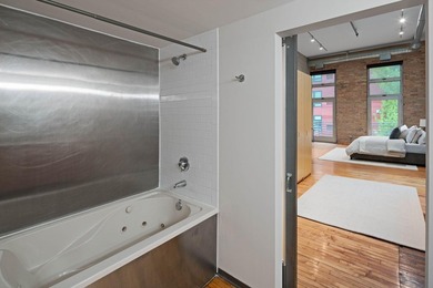 Located in the historic 801 lofts, this authentic loft offers a - photo 25