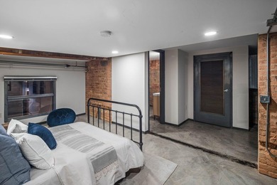 Located in the historic 801 lofts, this authentic loft offers a - photo 28