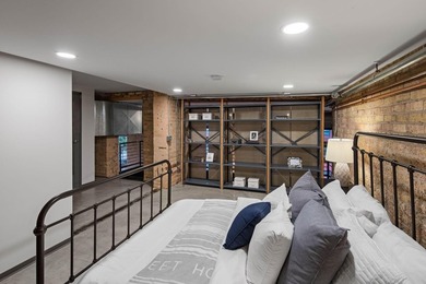 Located in the historic 801 lofts, this authentic loft offers a - photo 29