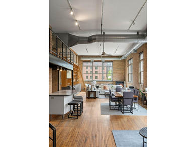 Located in the historic 801 lofts, this authentic loft offers a - photo 32