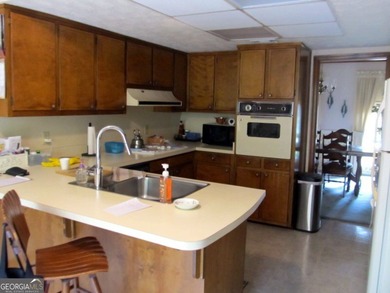 Solid home located in Lake Capri. Expansive, private deck on the - photo 14