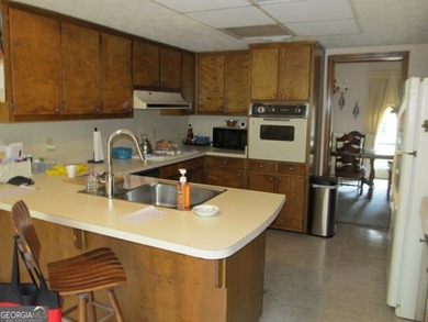 Solid home located in Lake Capri. Expansive, private deck on the - photo 15