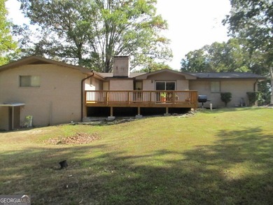 Solid home located in Lake Capri. Expansive, private deck on the - photo 24