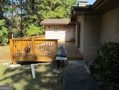 Solid home located in Lake Capri. Expansive, private deck on the - photo 25