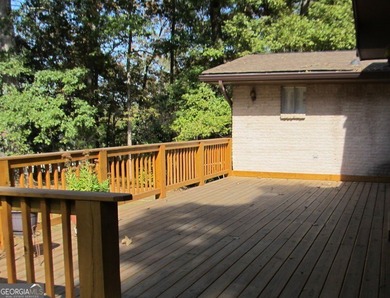 Solid home located in Lake Capri. Expansive, private deck on the - photo 26