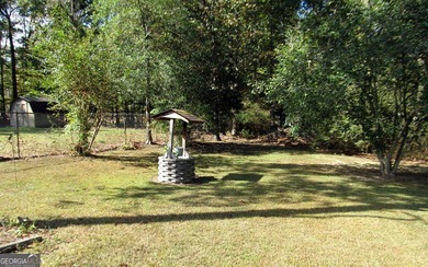 Solid home located in Lake Capri. Expansive, private deck on the - photo 27
