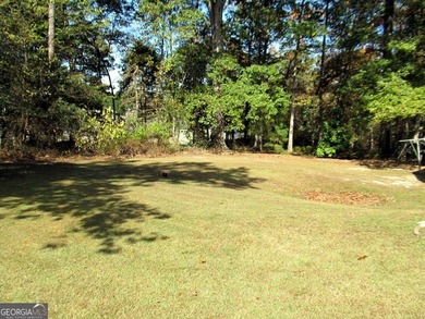 Solid home located in Lake Capri. Expansive, private deck on the - photo 28