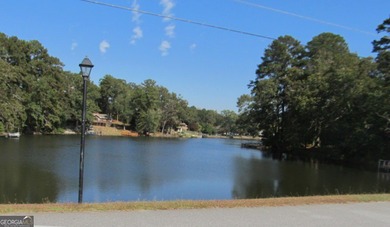 Solid home located in Lake Capri. Expansive, private deck on the - photo 29