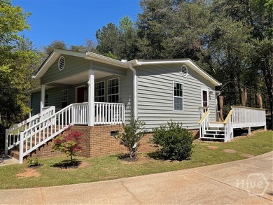 Welcome to your fully updated retreat in the highly sought-after - photo 1