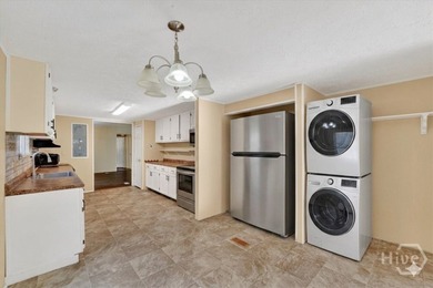 New PRICE - Charming 3 bed, 2 bath home nestled in a peaceful - photo 4