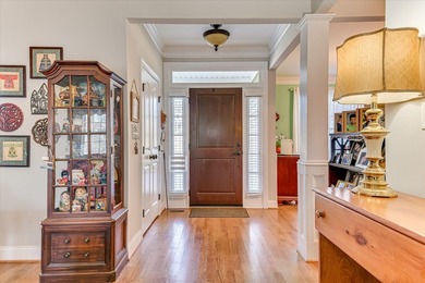 This exquisite home in the prestigious Windmill Plantation