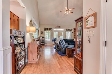 This exquisite home in the prestigious Windmill Plantation