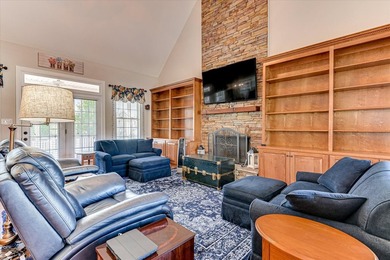 This exquisite home in the prestigious Windmill Plantation