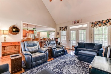 This exquisite home in the prestigious Windmill Plantation